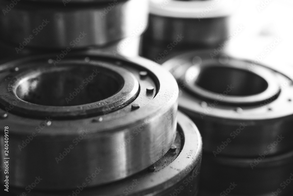 Machinery concept. Set of various gears and ball bearings old and new, BW, black and white Machinery concept. Set of various gears and ball bearings old and new, BW, black and white
