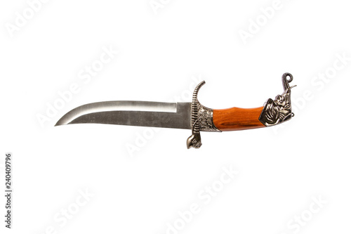 Curved ceremonial dagger knife with a decorative sheath isolated on a white background. Vintage dagger on a white background. Dagger mockup on white.