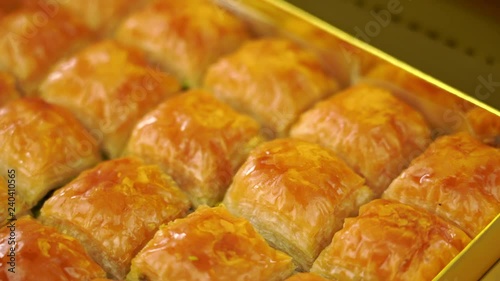 Traditional, delicious Turkish baklava with green pistachio nuts . 4k video