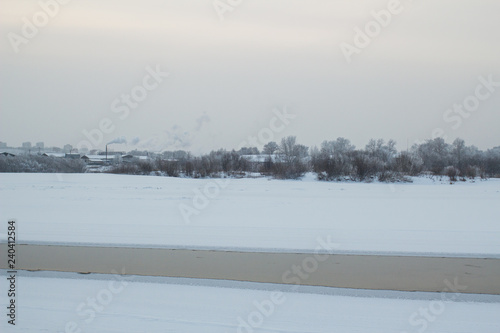 winter landscape with lake and trees © Alexnow