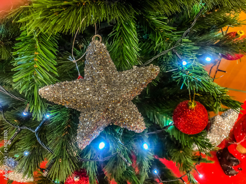 Big Stars on Christmas Tree in Christmas Days.
