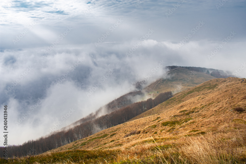 Big clouds and fog in the mountains. Bieszczady National Park - Poland