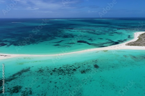 Los Roques, Carribean sea. Fantastic landscape. Aerial view of paradise island with blue water. Great caribbean beach scene © ByDroneVideos