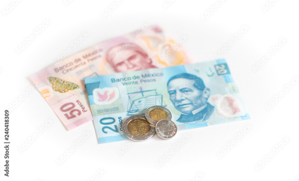 Coins and banknotes of Mexico in different denominations - The Mexican peso on white background Coins and banknotes of Mexico in different denominations - The Mexican peso on white background