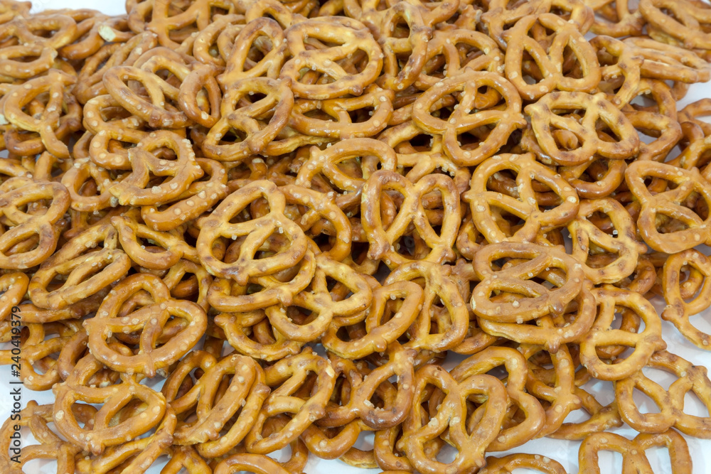 Pile of crunchy mini snack pretzels. Pile of crunchy mini snack pretzels.