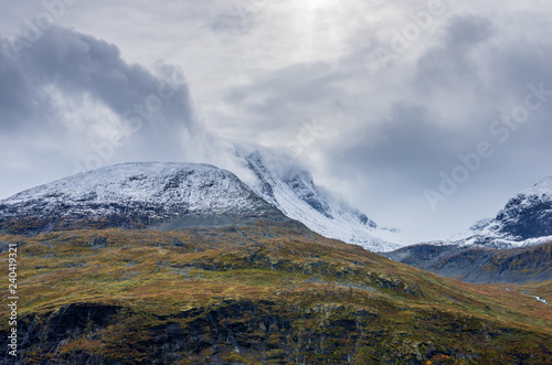 snowy mountains on a cloudy day in norway