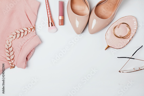 Outfit in beige and pale pink colors, top view