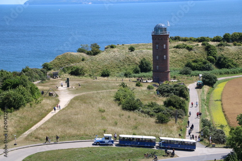 Tourist train and Lighthouse Peilturm at Cape Arkona on Island of Rügen, Germany Baltic Sea  photo