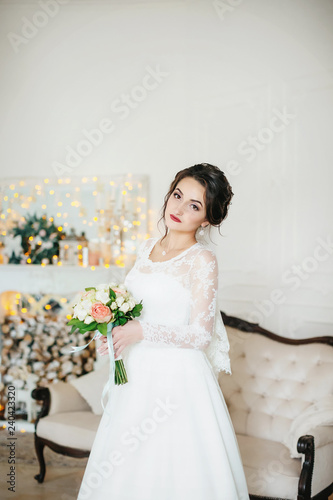 Beautiful brunette bride with stylish make-up in white dress © Forewer