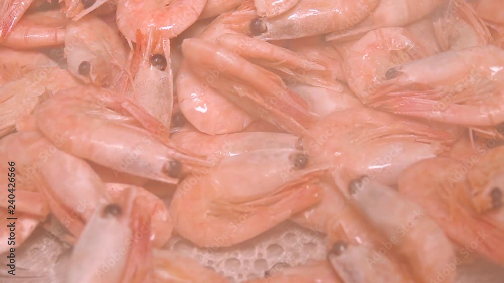 Falling hot tasty boiled shrimps in slow motion close-up Falling hot tasty boiled shrimps in slow motion close-up