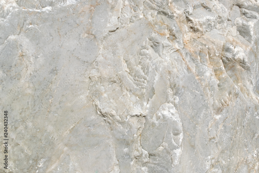 texture of stone on the seashore close-up. gray background of marble stone. texture of stone on the seashore close-up. gray background of marble stone.