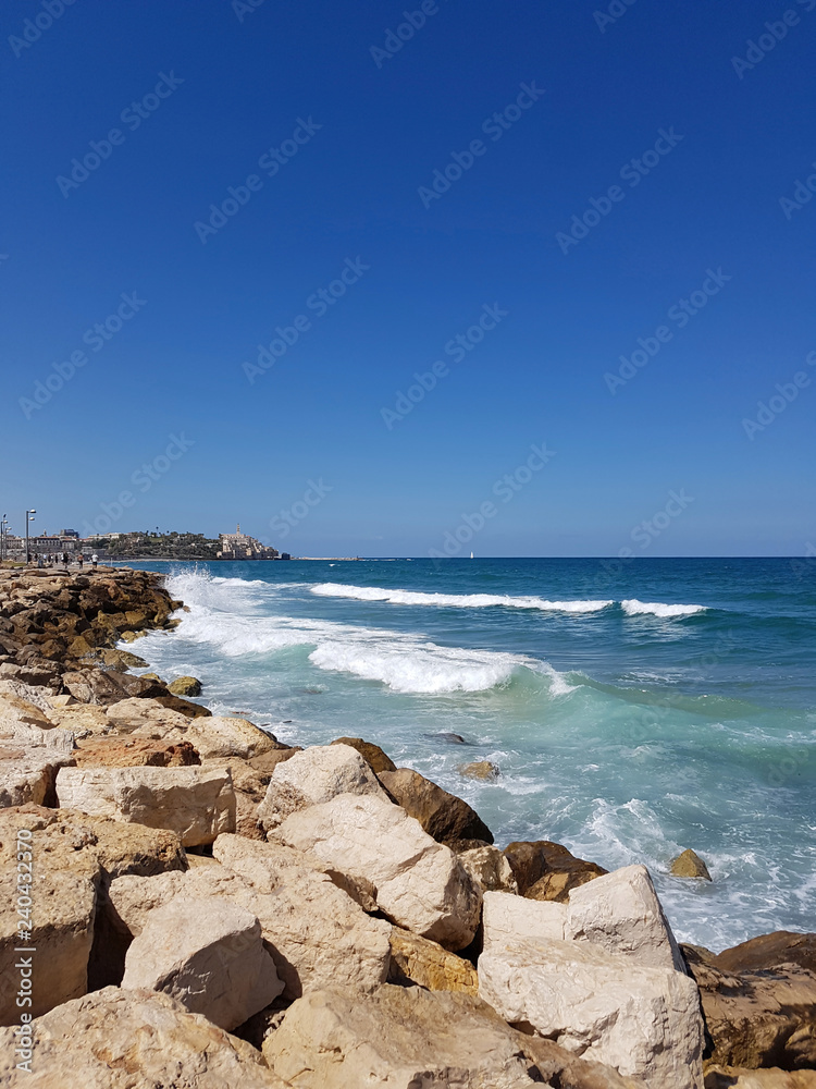 View of the Old Jaffa town, Tel Aviv, Israel. Beautiful view of the sea from the shore. Embankment in the city.