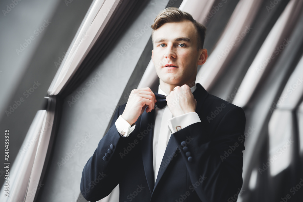 Headshot portrait of young man smiling isolated on outside outdoors background Headshot portrait of young man smiling isolated on outside outdoors background