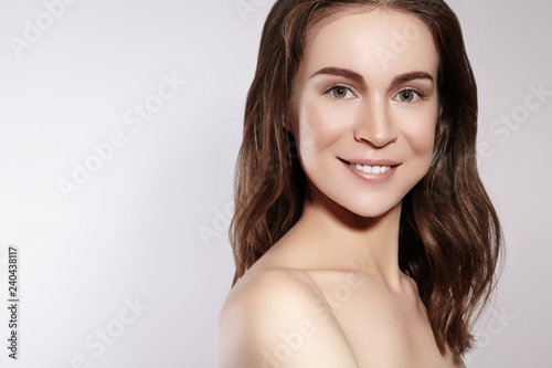 Beautiful Smiling Woman with Clean Skin  Natural Make-Up. Joyfull and Happiness. Emotional Female Face. Health  Wellness