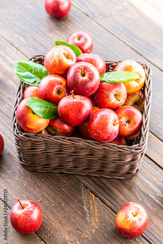 Red apple in basket