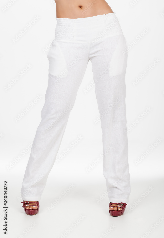 fashion lady white pants for women in neutral background fashion lady white pants for women in neutral background