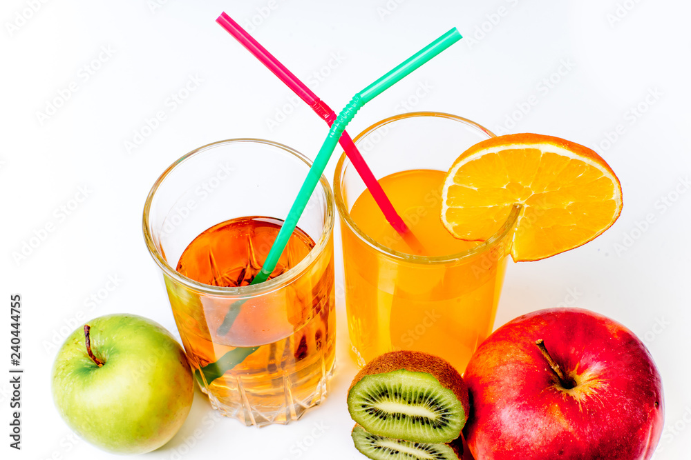 different fruit and juice or smoothie in a glass different fruit and juice or smoothie in a glass