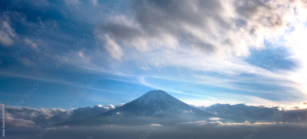 Mountain Fuji in sea of mist or fog at sunrise with cloudy sky, Fujikawaguchiko, Yamanashi, Japan. Mountain Fuji in sea of mist or fog at sunrise with cloudy sky, Fujikawaguchiko, Yamanashi, Japan.