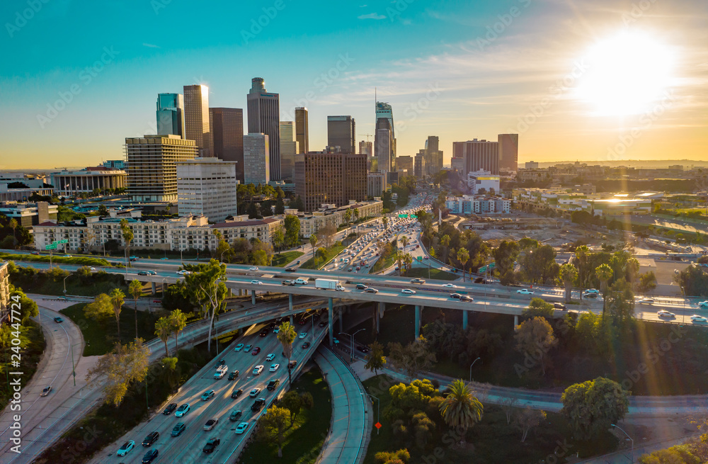 Fototapeta premium Drone shot of heavy traffic in urban Los Angeles causing CO2 emissions, pollution and climate change.