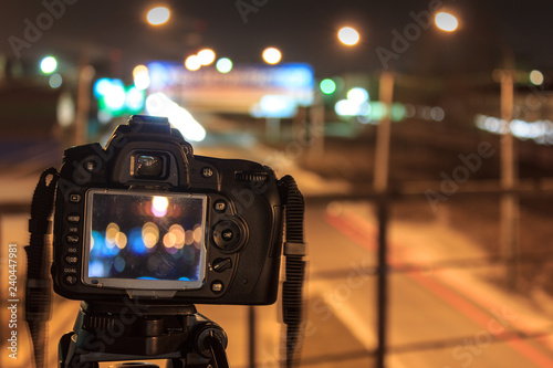 Сamera on a tripod for night shooting urban landscapes