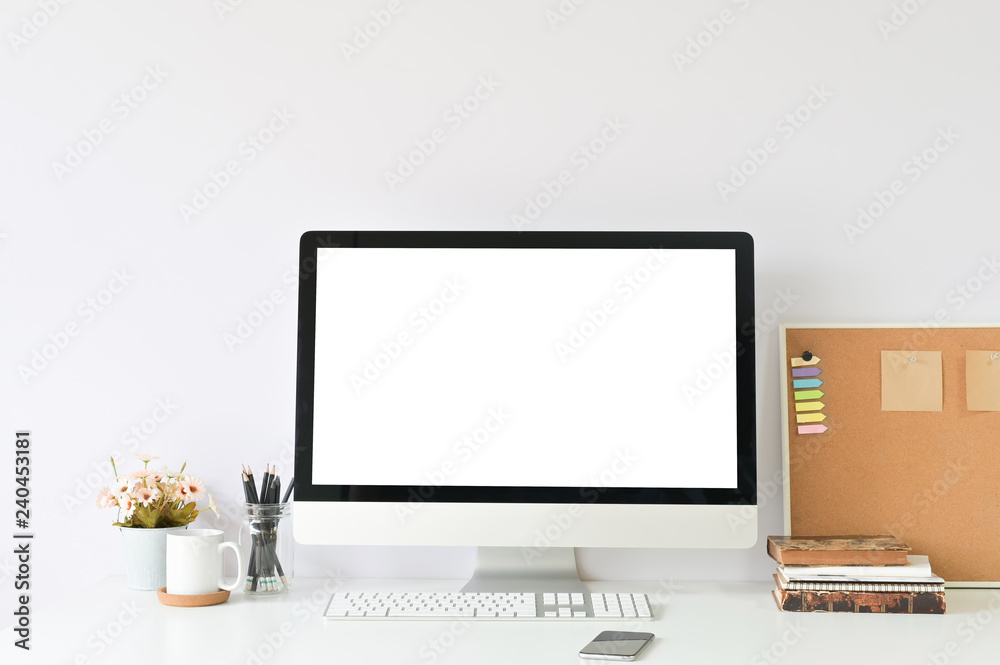 Workspace with Mockup laptop computer on office table and office supplies. Workspace with Mockup laptop computer on office table and office supplies.
