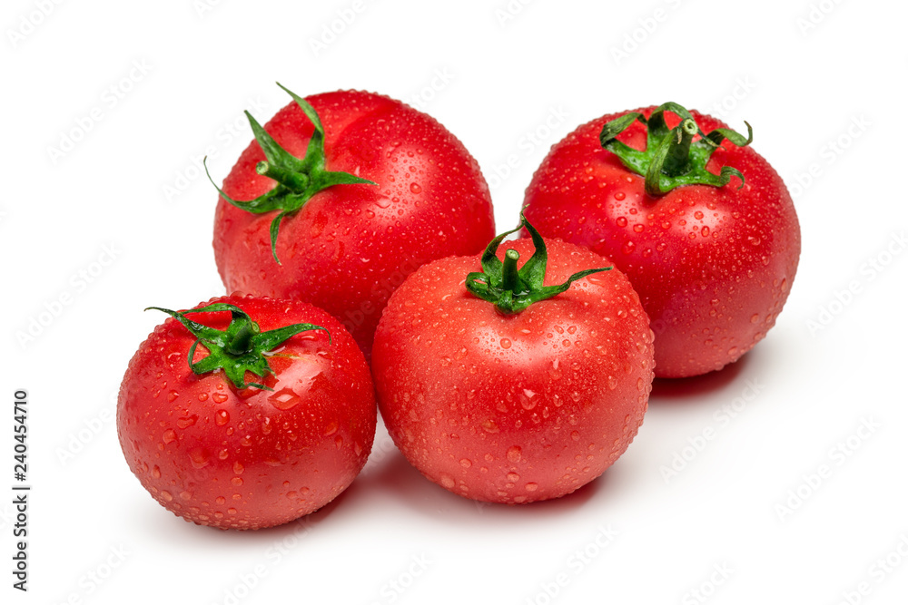 Four fresh red tomatoes isolated on white background