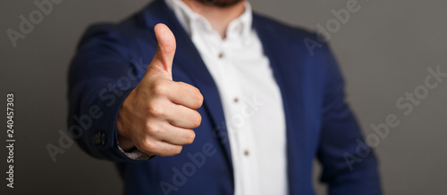 Fotografia Unrecognizable businessman showing thumb up gesture panorama