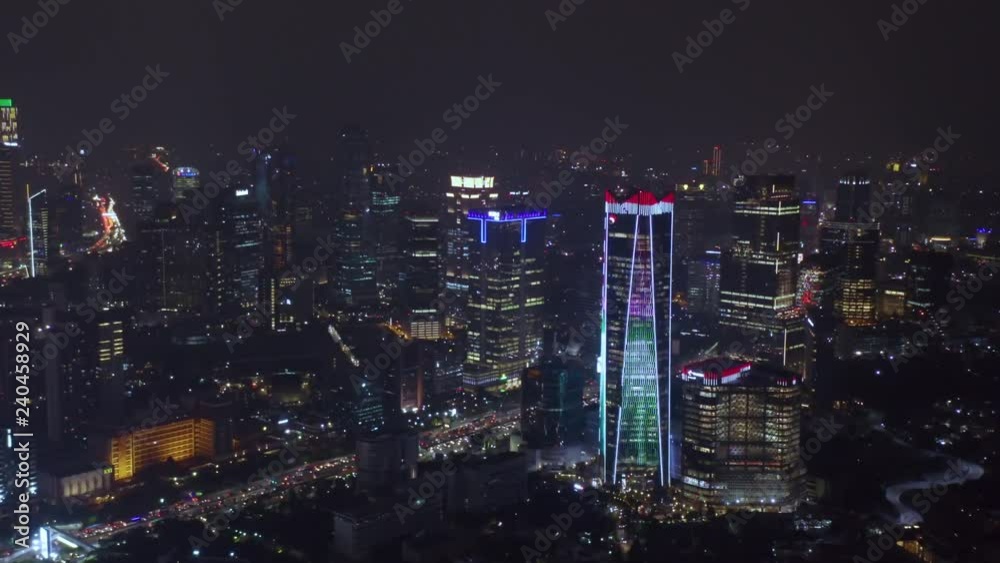 JAKARTA, Indonesia - December 17, 2018: Beautiful aerial view of night time in Jakarta financial center with skyscrapers view and night lights. Shot in 4k resolution JAKARTA, Indonesia - December 17, 2018: Beautiful aerial view of night time in Jakarta financial center with skyscrapers view and night lights. Shot in 4k resolution