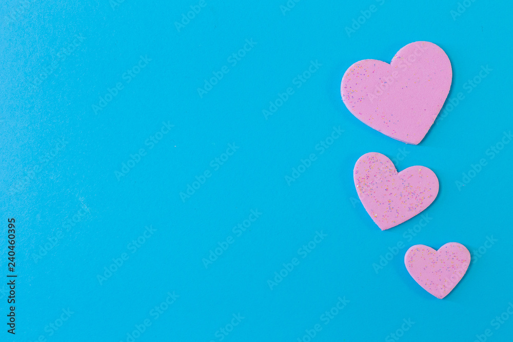heart on blue background close up image. heart on blue background close up image.