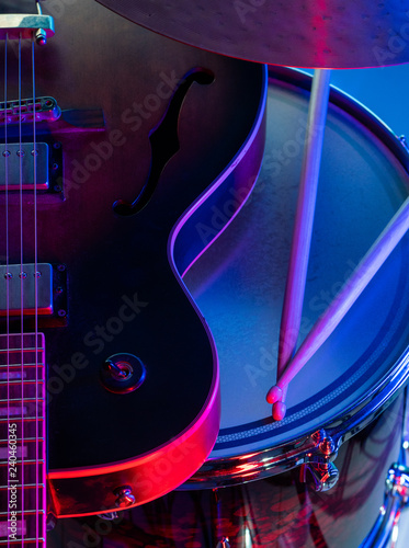 Canvas Print drum with sticks and guitar on abstract background