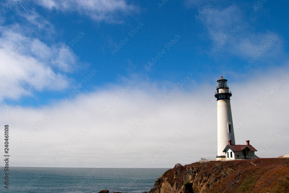 lighthouse and cloud