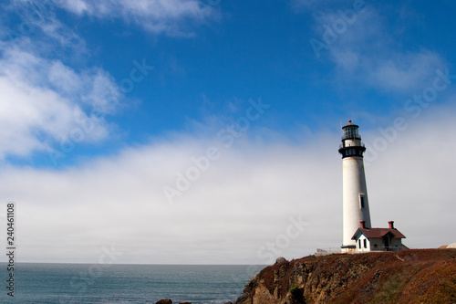 lighthouse and cloud