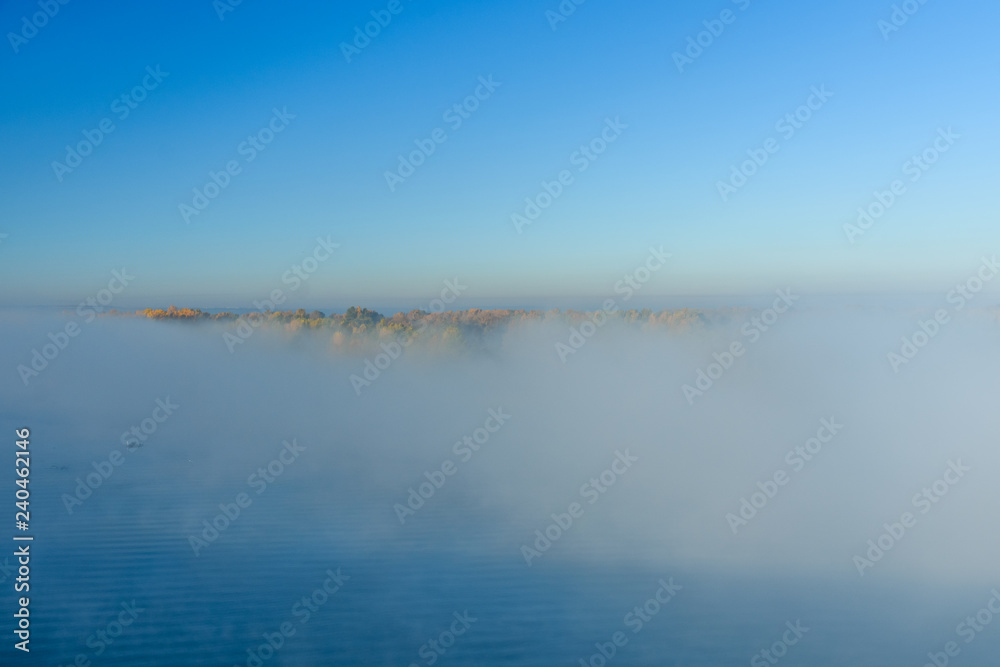 Fog over the water on a river Dnieper on autumn