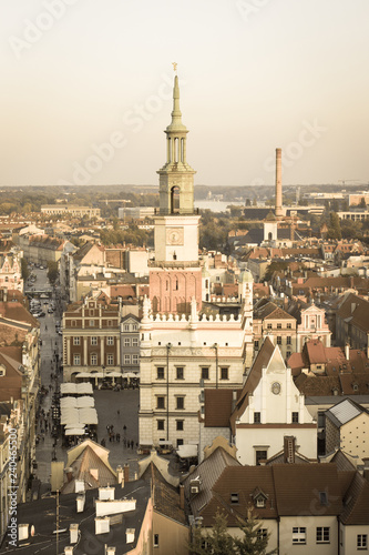 Poznan, Poland - October 12, 2018: Town hall and other buildings in polish city Poznan. Aged photo