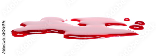 Spilled red wine puddle isolated on white background 