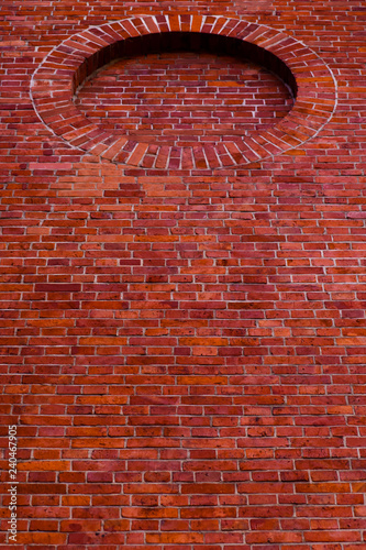 circle on a brick wall 