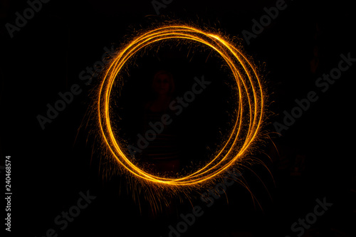 Abstract sparkler firework light on black background