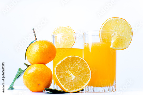 different fruit and juice or smoothie in a glass