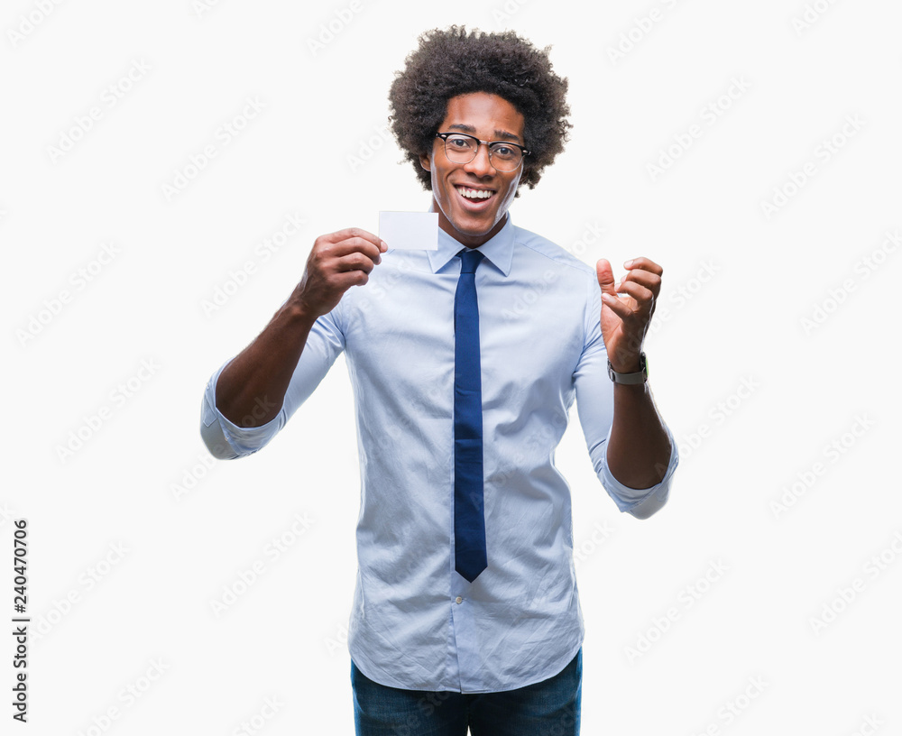 Afro american man holding visit card over isolated background very happy and excited, winner expression celebrating victory screaming with big smile and raised hands Afro american man holding visit card over isolated background very happy and excited, winner expression celebrating victory screaming with big smile and raised hands