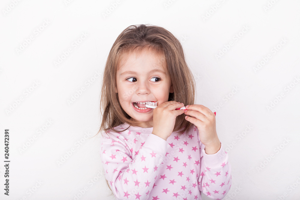 Cute little girl brushing her teeth Cute little girl brushing her teeth