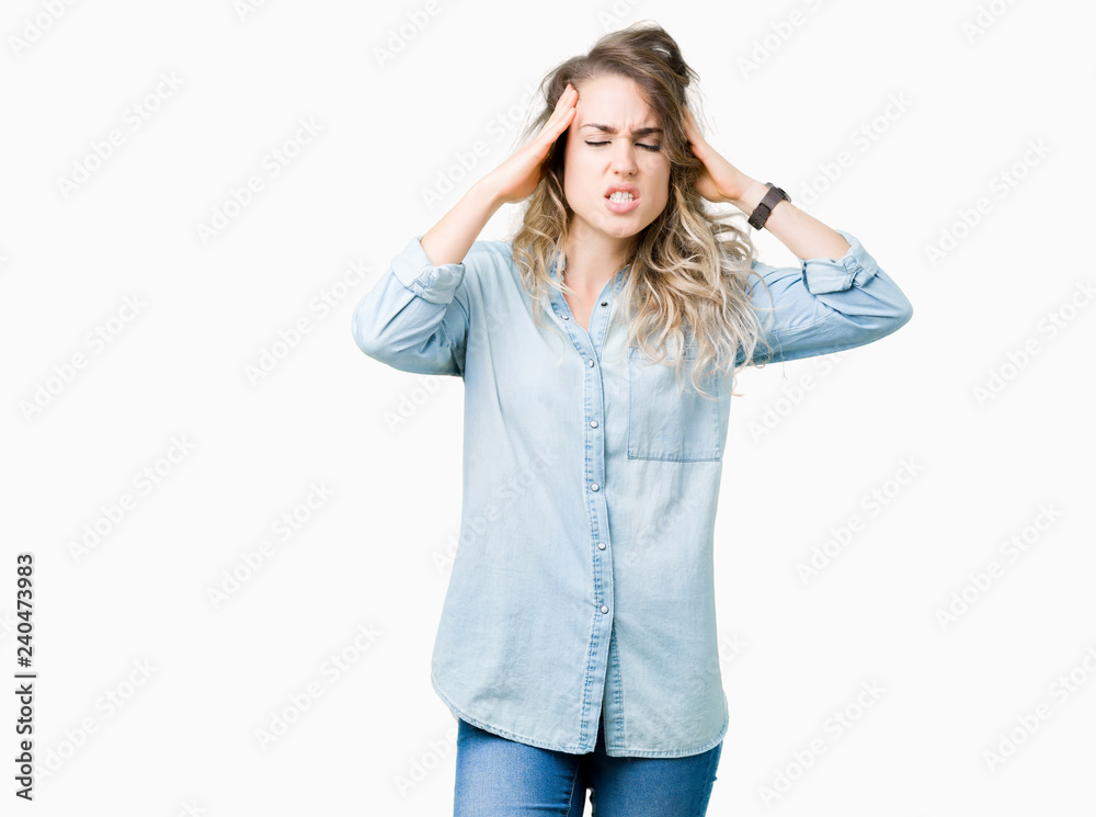 Beautiful young blonde woman over isolated background with hand on head for pain in head because stress. Suffering migraine. Beautiful young blonde woman over isolated background with hand on head for pain in head because stress. Suffering migraine.