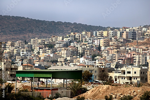 The city of Nazereth located in the hilly region Galilee in North region of Israel photo