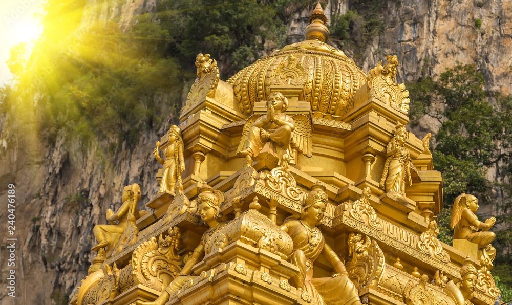 Golden sun Indian temple Batu Caves Golden sun Indian temple Batu Caves