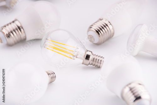 Led lamps lie on a white background. Theme energy saving in the house