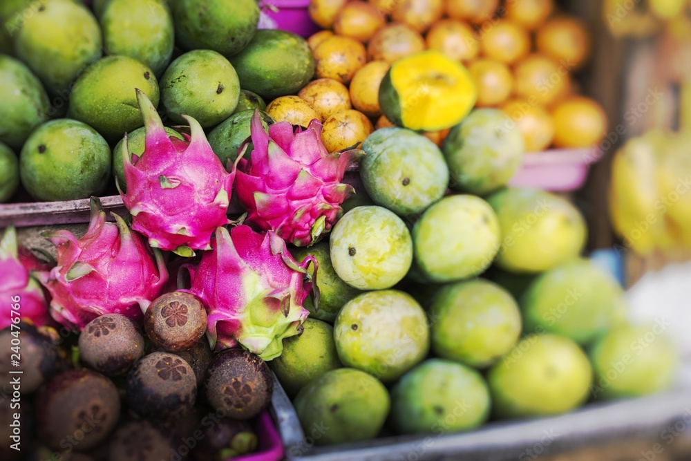 Open air fruit market in the village in Bali. Selective Focus. - obrazy, fototapety, plakaty 
