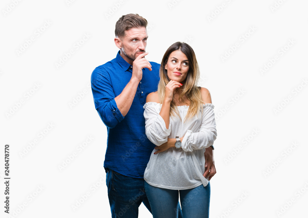 Young couple in love over isolated background with hand on chin thinking about question, pensive expression. Smiling with thoughtful face. Doubt concept. Young couple in love over isolated background with hand on chin thinking about question, pensive expression. Smiling with thoughtful face. Doubt concept.