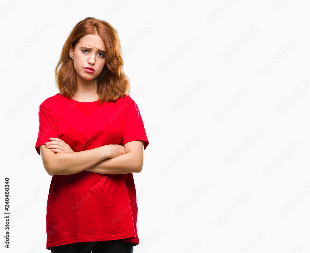 Young beautiful woman over isolated background skeptic and nervous, disapproving expression on face with crossed arms. Negative person. Young beautiful woman over isolated background skeptic and nervous, disapproving expression on face with crossed arms. Negative person.