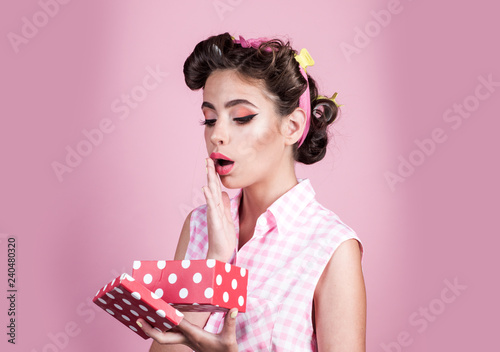 pretty girl in vintage style. retro woman on berthday party. pin up woman with trendy makeup. pinup girl with fashion hair. happy birthday. Party celebration. i love this present photo