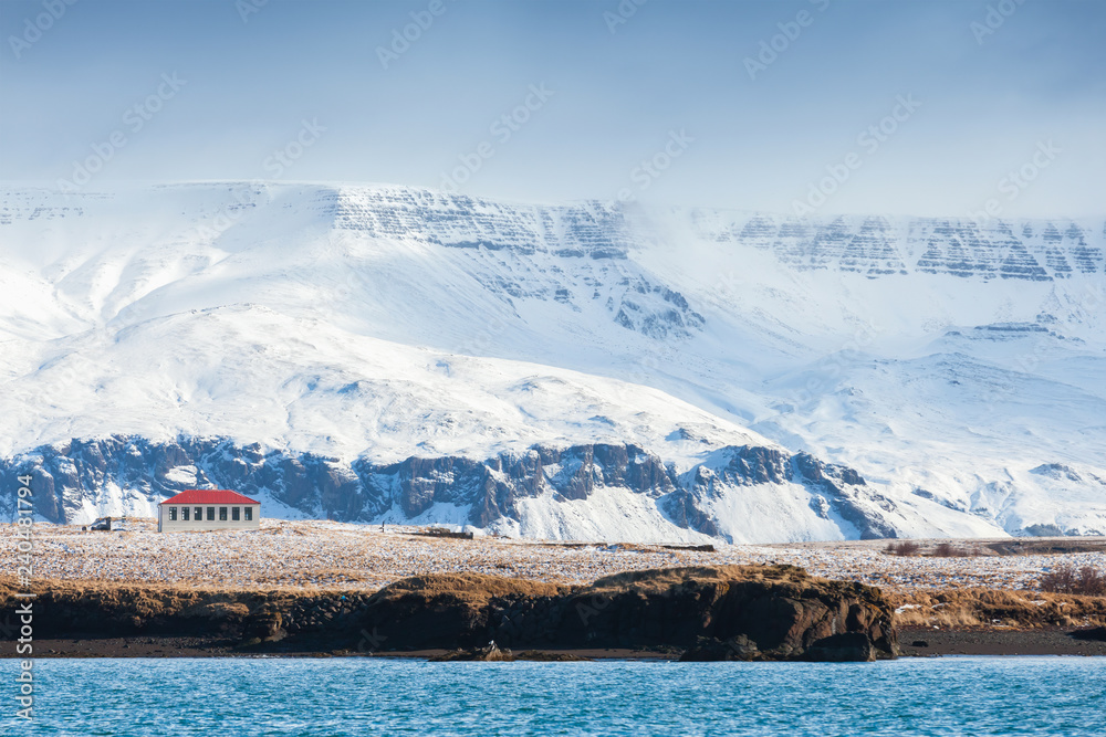 Mountains and lonely house. Reykjavik