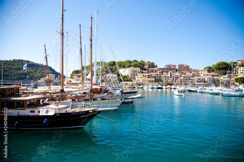 yachts on the background of bright blue sea and mountains